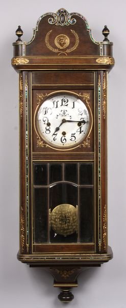 Antique wall clock w/mother-of-pearl inlay: Antique wall clock with mother-of-pearl inlay, 38 1/2" h. x 12 1/2" w. x 7" d. Good condition.