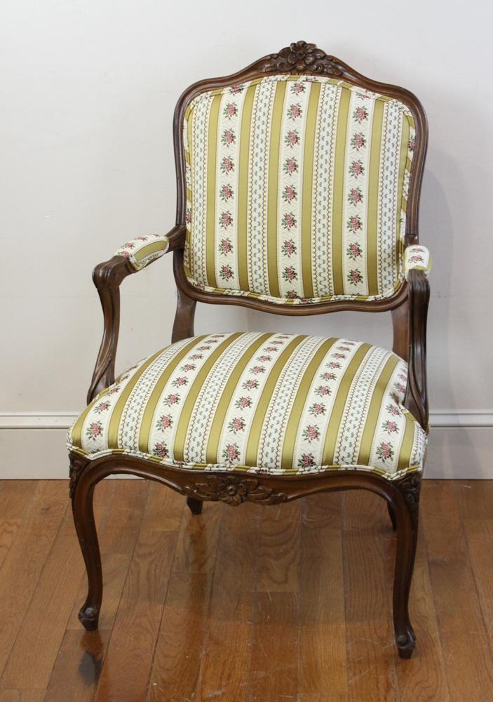 French Style Upholstered Armchair: French-style armchair with floral striped upholstery, 37 1/2" H x 23 1/2" W x 21" D. Provenance: Estate of Evelyn Wallace Richter, Palm Beach, Florida.