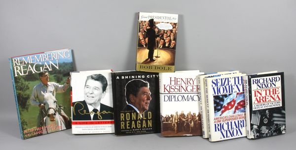 Group of books etc. about Reagan, Kissinger, and 