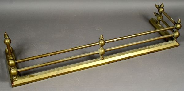 Mid 19th Century English Brass Fire Fender: Mid 19th Century English brass fire fender, 9 1/2"h. x 46"w. x 14"d. Good condition.