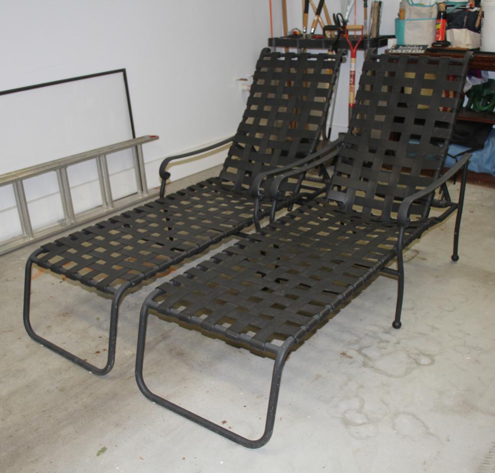 Pair of Aluminum and Webbed Lawn Chaises: Pair of adjustable aluminum and webbed lawn chaises with black matte finish, 62" L x 25" W. Good condition. Provenance: Estate of Dr. David L. Vastola, Rockport, Massachusetts.