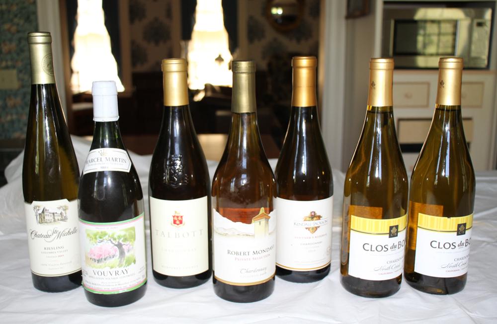 Assorted White Wines, Seven Bottles: White wine, seven (7) bottles total to include, Clos du Bois, North Coast Chardonnay 2013; Vouvray, White Loire 1998; Chateau Ste Michelle, Columbia Valley, Riesling 2015; Robert Mondavi, Private Sele