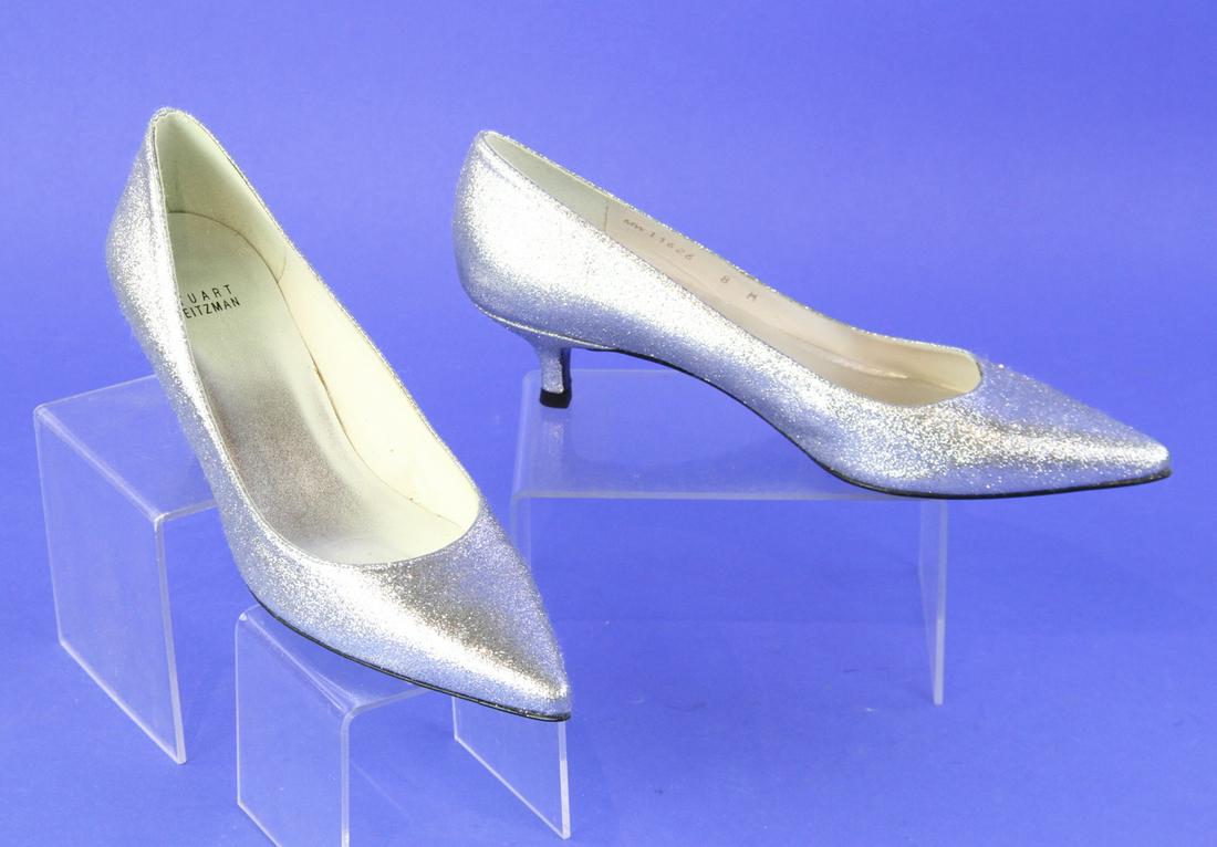 Stuart Weitzman Silver Glitter Pumps: One pair of Stuart Weitzman silver glitter low heel pumps.