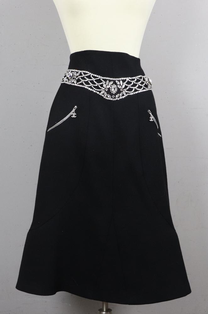Chanel Black Flared Skirt with Rhinestones: Chanel black flared skirt with rhinestone decoration., size 40.