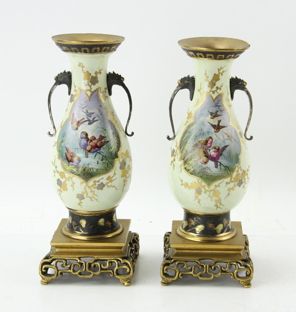 Porcelain Vases, Pair with Bases: Pair of porcelain vases on ormolu bases and elephant trunk handles, 11" H. Provenance: Private Massachusetts Estate.