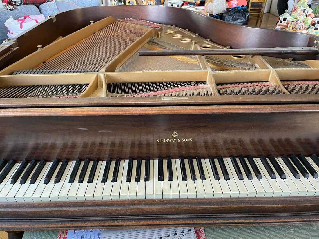 Steinway Grand Piano: Steinway grand piano, M-260012 serial number L-O G 3511 with bench. Provenance: Estate of Jonathan Seiberg of Lynn, Massachusetts.