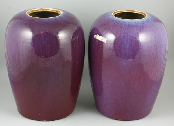 Pr. of 19th C. porcelain tea caddy jars: Pair of 19th Century glazed porcelain tea caddy jars without covers, 11" h., chips to bases. Provenance: Robert O. Peterson Estate, San Diego, CA.