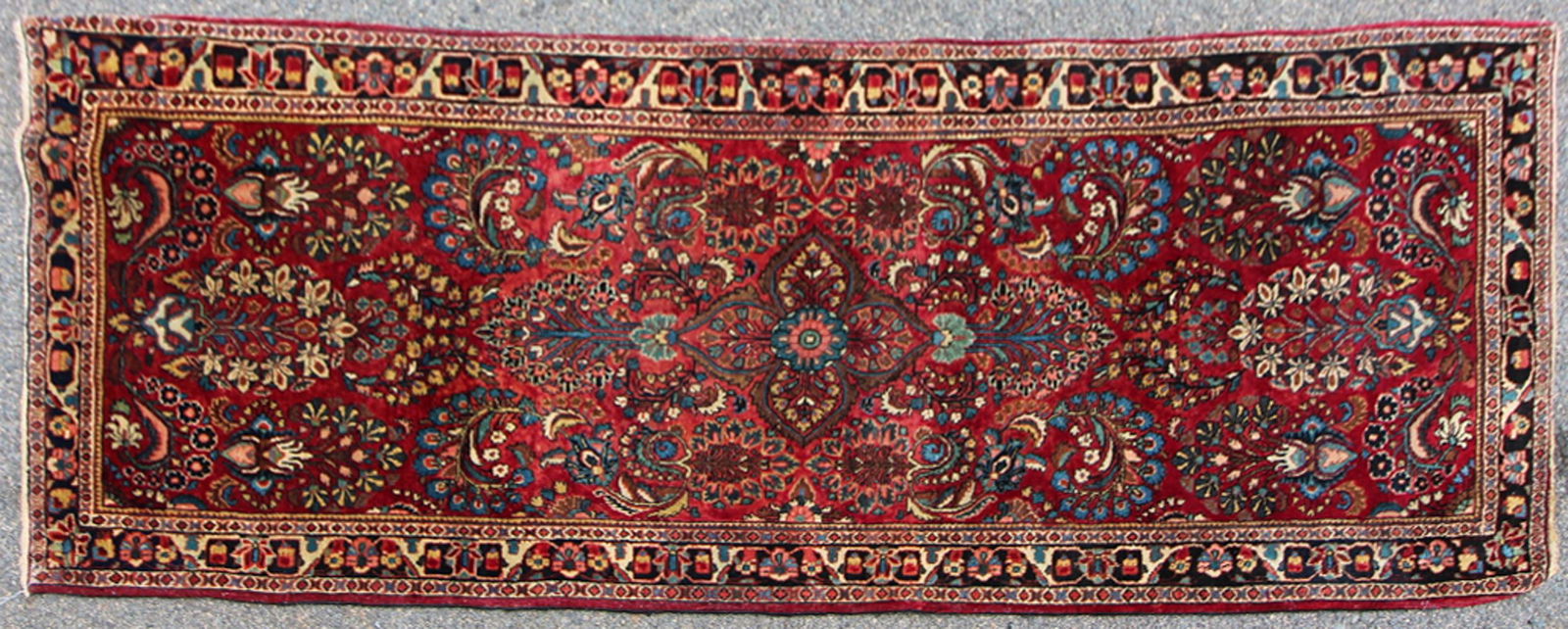 Antique Persian Sarouk Rug: Antique Persian Sarouk rug, 6'8" x 2'6". Provenance: Ipswich, Massachusetts.