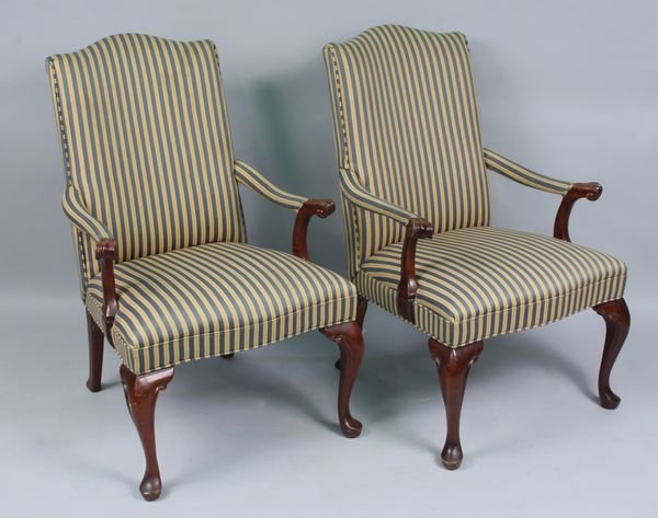 Pair of 20th C. Queen Ann mahogany arm chairs: Pair of 20th Century Queen Ann mahogany arm chairs, 40" h. x 27" w. x 27" d.
