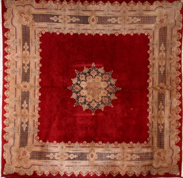 Semi Antique Persian Kerman rug: Semi Antique Persian Kerman rug having a red field, 10' 8" x 10' 8".