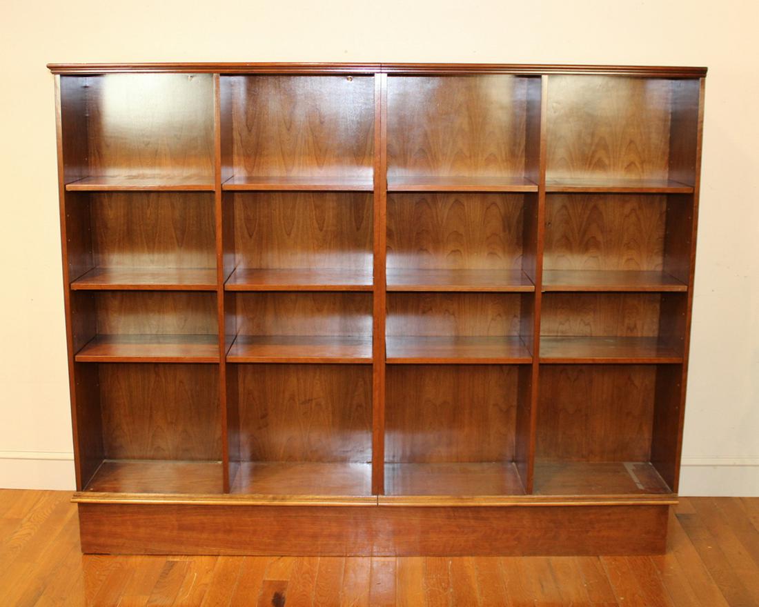 Mahogany Bookcase: Mahogany bookcase, 62in H x 77in W x 12in D.