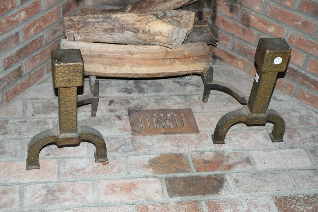 Pair of Cast Iron Square Top Andirons: Pair of cast iron square-top andirons, 16" H x 10" W (across base). Good condition. Provenance: Collection of Pat and Nathan Kornfeld, Verbank, New York.