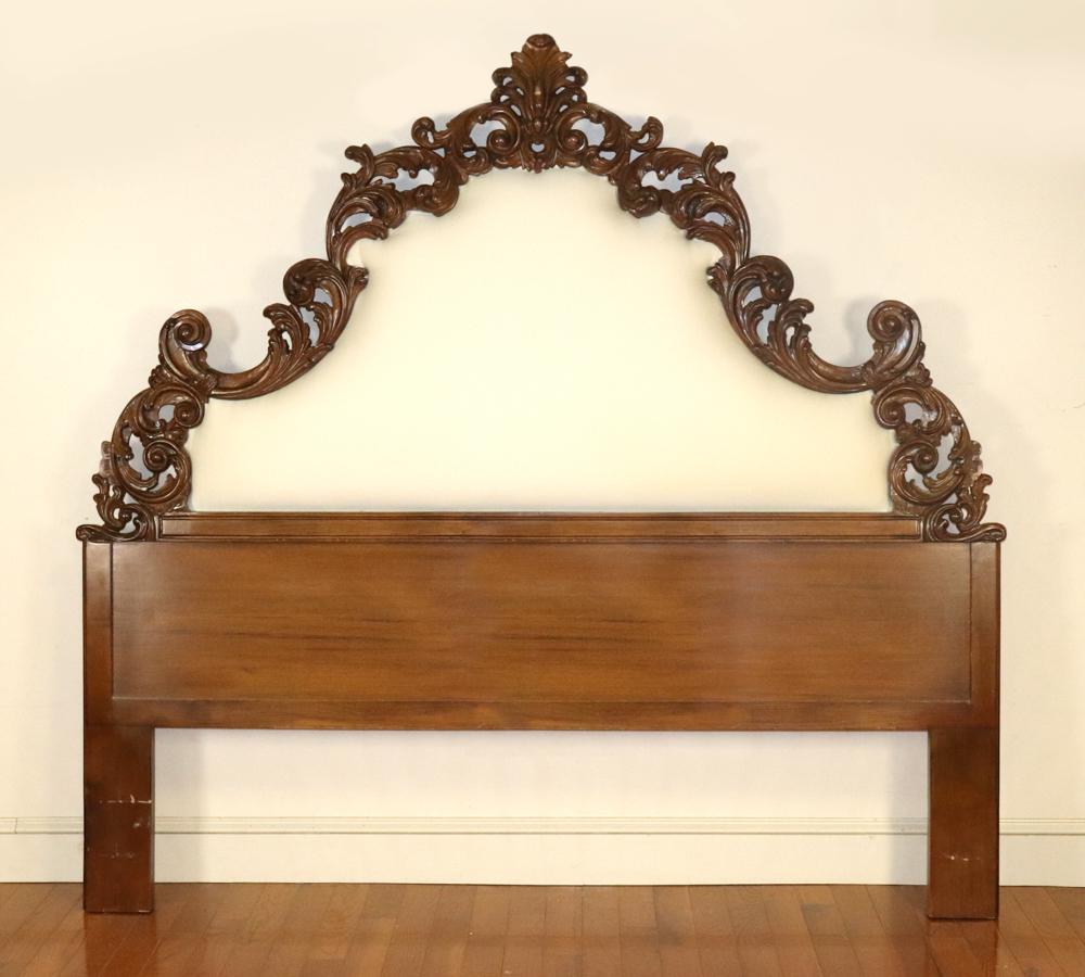 Italian Carved Walnut Headboard: Italian carved walnut headboard with linen upholstery, 78" H x 80" W. Provenance: Contents of Palazzo Fiorito on the ocean, Fort Lauderdale, Florida.
