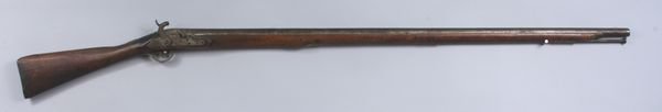 Revolutionary War Era Percussion Rifle: Revolutionary War era percussion rifle, possibly with modified firing mechanism, 56 3/4" length overall, 41 1/2" barrel. Waterman estate lore has modification C. 1812. Includes rod. Missing butt plate