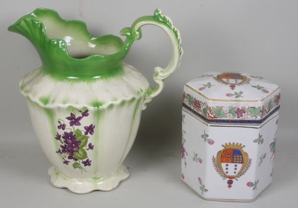 Lot of Two (2) British 19th C. Objects: Lot of two (2) British 19th Century objects including a ironstone pitcher, circa 1911, and a lidded jar, 8" x 7" with armorial crests.