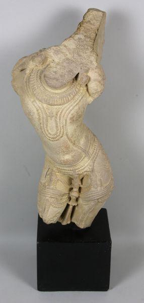 Limestone Apsara Fragment: Limestone Apsara fragment on modern base, 14"h x 6 1/2"w x 4 1/2"d, base measures 4"h x 4"w x 4 1/2"d