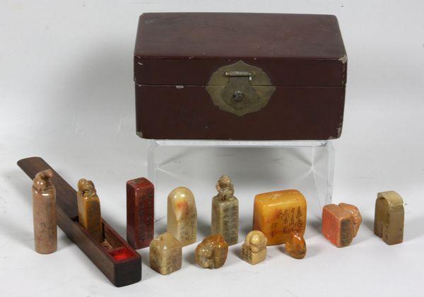 Antique Box w/ Soapstone Seals: Antique lacquered box with carved floral design on lid, containing twelve (12) soapstone seals, 2"h x 7"w x 4"d. Good condition.