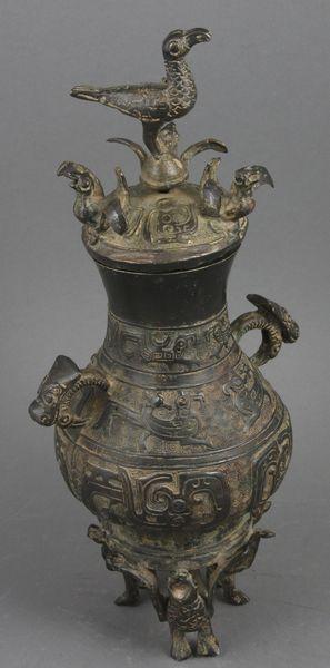 Old Chinese Bronze Covered Jar w/ Bird Finial: Old Chinese bronze covered jar having bird finial top cover, 12 1/2" x 6".