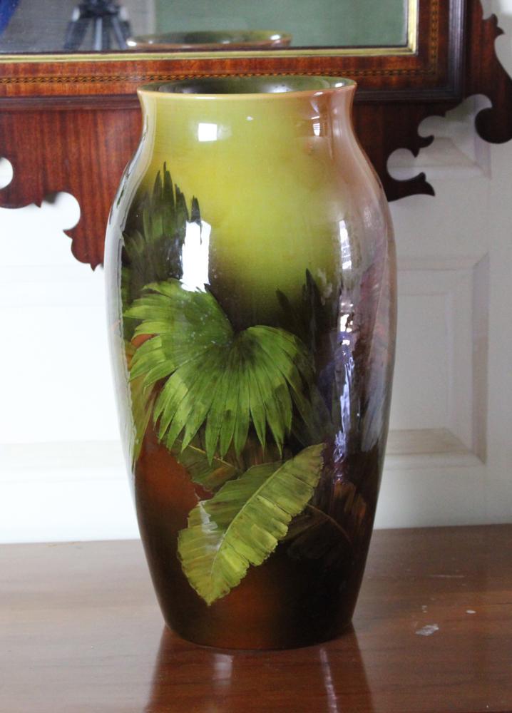 Circa 1893 Matt Daly Initialed Rookwood Iris Glaze Vase: Circa 1893 Rookwood "Iris Glaze" vase with palm fronds, artist initialed for Matt Daly, 'MAD./L', numbered '139 A over W', seven flames in mark, 17 1/2" H x approximately 8 1/2" diameter. Good conditi