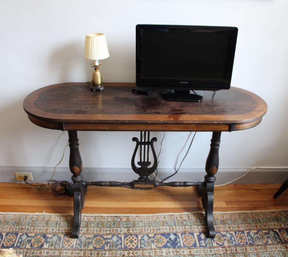 Antique English Butler's Tray and Lyre Base Table Hall: Antique English butler's tray on mahogany and canvas strap luggage stand, together with walnut and mahogany lyre base hall table, tray 3 1/4" H x 26" W x 18 3/4" D, table 29" H x 48" W x 17 3/4" D. Bo