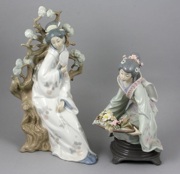 Two (2) Lladro Figurines: Two (2) Lladro figurines: Geisha #4807 (12"h) and Graceful Offering # 5773 (9"h). Good condition.