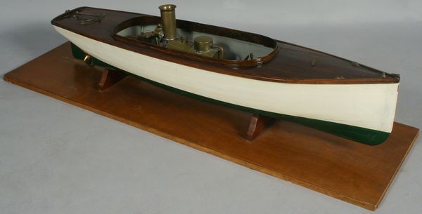 C. 1920 Model of Steam Launch: Circa 1920 model of a steam launch with Boucher engine, 42"l x 10"h x 9 3/4"beam, 47 1/2"l x 14 3/4"w on stand. Last operated in 2005, good condition.