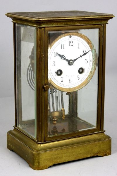 French Regulator Clock: French bass and crystal regulator clock with pendulum, marked on works "Medaille D'Argent 1889", 8 3/4"h x 5 1/2"w x 4 1/2"d. Some age wear.
