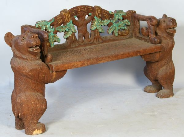 Black Forest Style Carved Wood Bench: Black Forest style carved wood bench with bears on sides, 26"h x 49"w x 13"d. Chip to bear's foot.