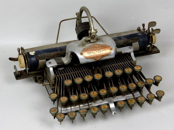 Military Battlefield "Blick" Typewriter : Military Battlefield "Blick" featherweight circular ball typewriter, 6 3/4"h x 12"w x 10"d.