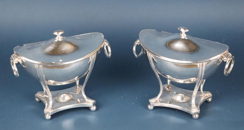 Pair of 19th Century Silver Plate Sauce Tureens: Pair of 19th century silver plate covered sauce tureens with ring handles, paw feet, mounted on ball-footed base, 7" H x 7 1/4" W x 4" D. Good condition. Provenance: Anthony's Pier 4 restaurant, Bosto