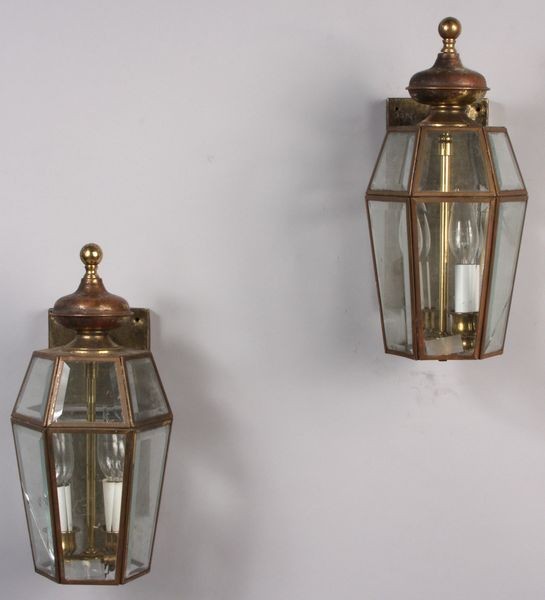 Pair of Brass Carriage Lamp Sconces: Pair of brass carriage lamp sconces, 14 1/2"h. Some glass panels cracked. Provenance: From the 20th Century Props lighting collection in Hollywood, C.A.