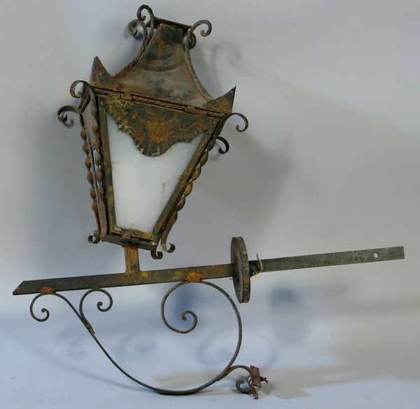 Large Outdoor Lantern on Wall Bracket: Large outdoor lantern on wall bracket with plastic shades, 30"h x 18"d, support arm is 13"l. Worn condition; requires repair. Provenance: From the 20th Century Props lighting collection in Hollywood, 
