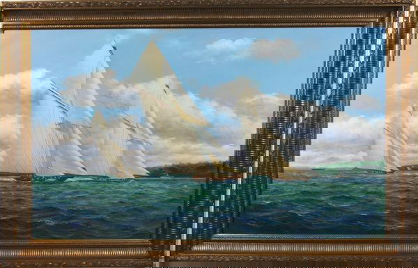 Signed O/C of a Yacht Regatta: Signed oil on canvas showing three (3) gaff-rigged cutters under full sail passing a wooded coastline, signed "P. Stanton" lower right, framed in wood painted gold, 30" x 50" sight size, 37" x 57" fra
