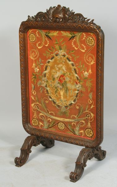 19th C. Victorian Fire Screen: 19th Century Victorian carved walnut and needlepoint fire screen, 40"h x 23"w.