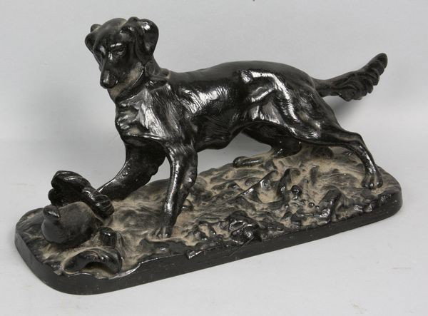 Cast Iron Dog Doorstop: Cast iron dog doorstop, 4 3/4"h x 13 1/2"l.