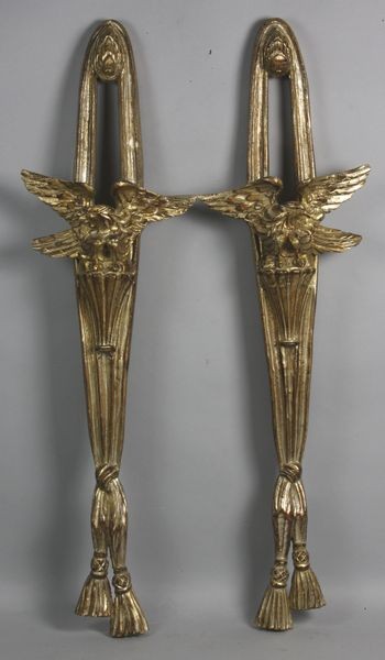 Pair of Italian Eagle Wall Mounts: Pair of Italian silver gilt camphorwood eagle wall mounts, 31"h x8 1/2"d.