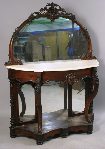 19th C. Rococo Victorian Server: 19th Century fancy Rococo rosewood Victorian server with white marble top and mirrored back, possibly J. & J. Meeks or John Henry Belter, 37"h x 51"w x 20"d.