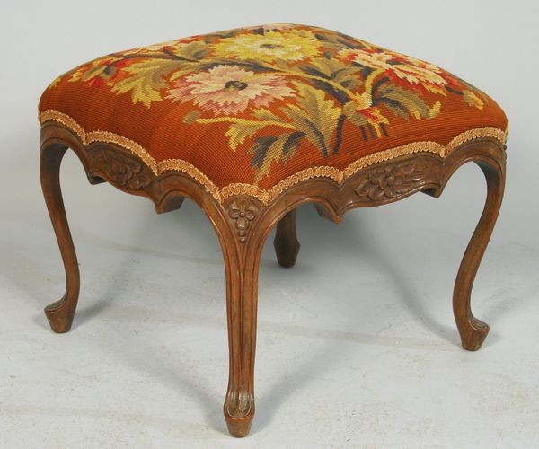 French Carved Needlepoint Stool: French carved needlepoint stool, 14"h x 19"w.