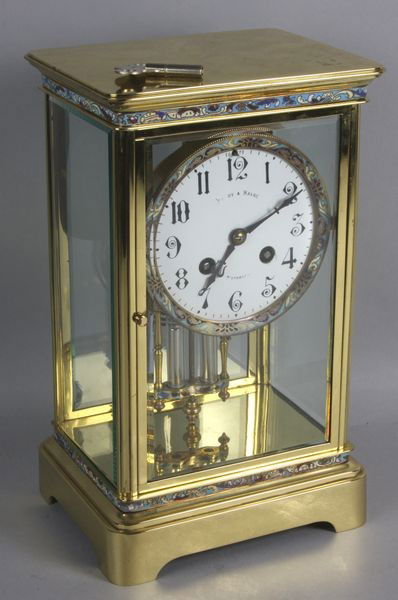 Brass and Glass Clock: Brass and glass clock with cloisonné trim and mercury pendulum. Good condition.