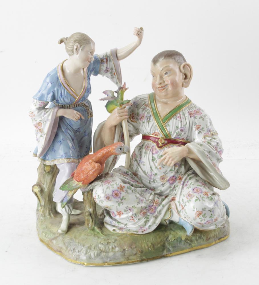 19thC Meissen Porcelain Figure of Chinese Woman: 19th century German Meissen porcelain figure of a Chinese woman with parrot and standing figure, 13" H x 12" W x 8" D. Minor finger loss. Provenance: Estate of August van der Becq, Westport, Connectic