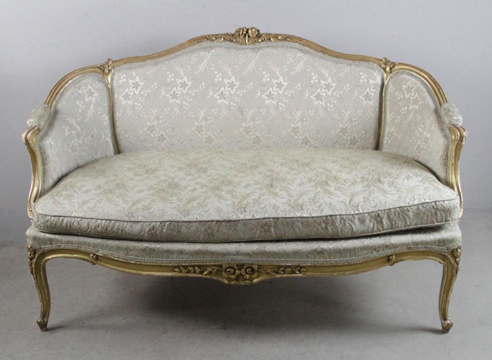 Late 19thC Louis XVI Style Upholstered Sofa: Late 19th century Louis XVI-style giltwood sofa with fancy embroidered upholstery, 34" H x 56" L x 29" D. Provenance: Estate of August van der Becq, Westport, Connecticut.