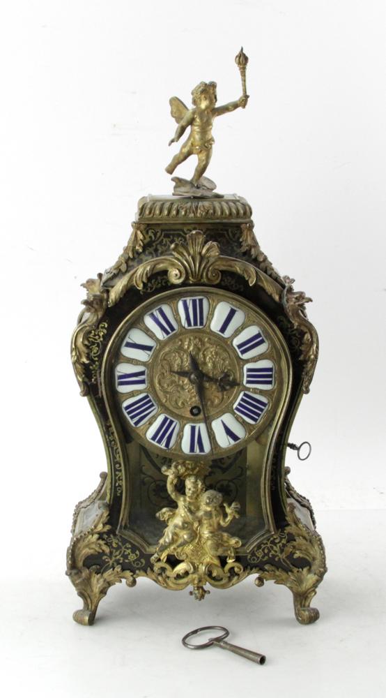18/19thC French Boulle Mantel Clock: 18th/19th century French Boulle mantel clock having bronze mounts, 23" H x 10" W x 5" D. With key. Provenance: Estate of August van der Becq, Westport, Connecticut.