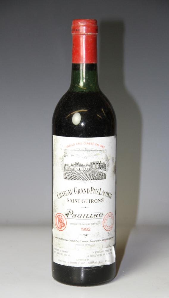 1982 Chateau Grand-Puy-Lacoste Saint Guirons Pauillac: 1982 Chateau Grand-Puy-Lacoste Saint Guirons Pauillac, 750ml. Stored in climate-controlled wine cellar. Provenance: Pier 4 Anthony Athanas collection of vintage wines.