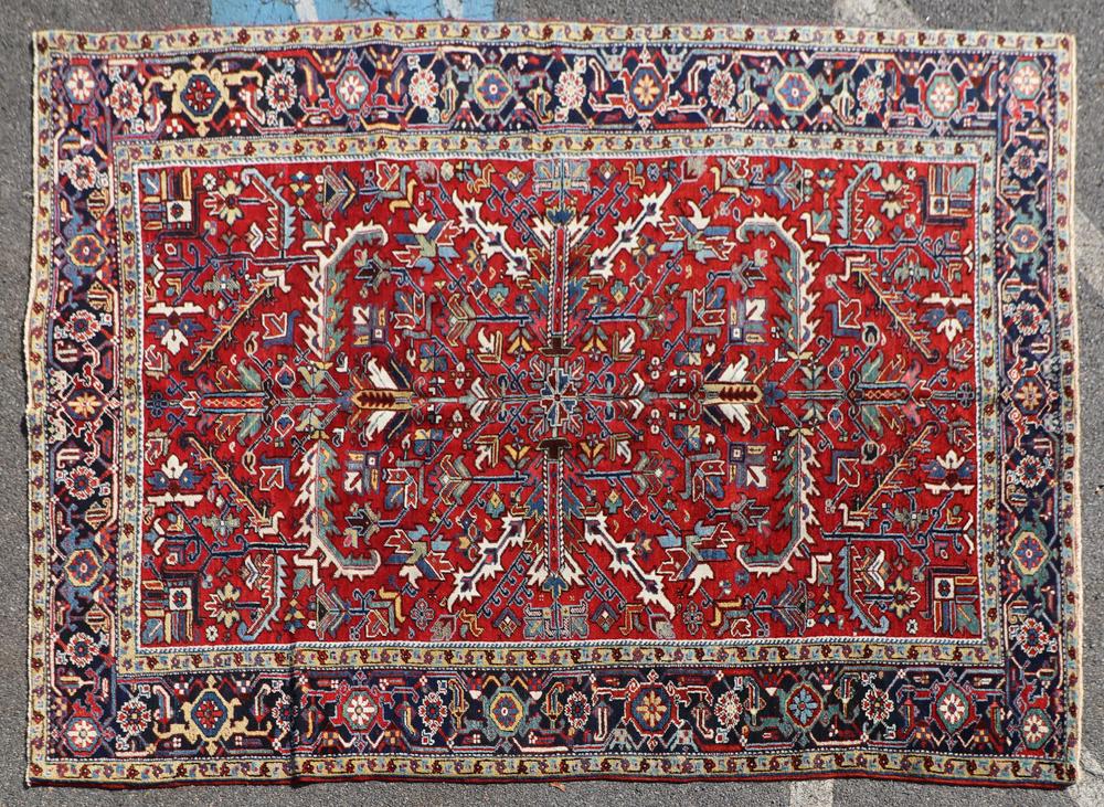Antique Persian Heriz Rug: Antique Persian Heriz rug, 9' 6" x 6' 11".