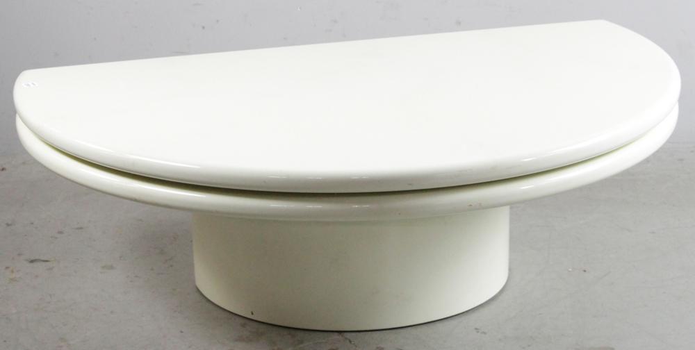 Mid-century Modern Swiveling Coffee Table: Mid-century Modern swiveling coffee table, having round bullnose shape and ivory lacquered wood, 16" H x 48" diameter, 30" folded. Provenance: Swampscott, Massachusetts.