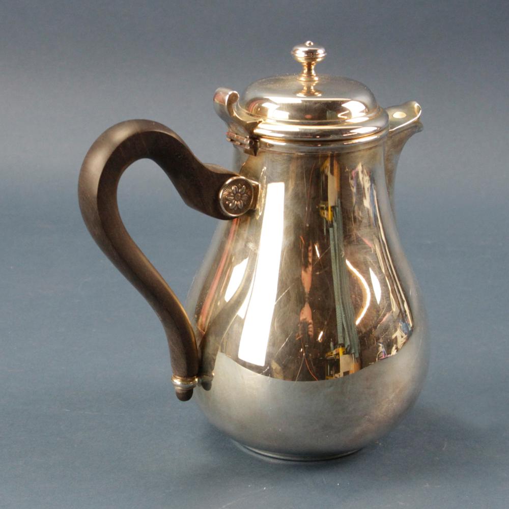 Christofle Tea Set, Butter Dish, Wine Coaster: Christofle France tea set comprising teapot, sugar, creamer, and butter dish, wine coaster, wine funnel. Note dent on bottom of sugar bowl. Provenance: Reading, Massachusetts collection.