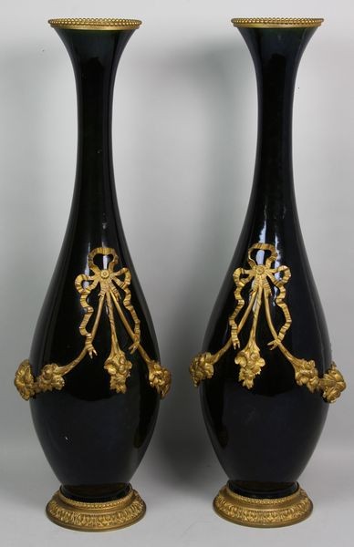 19th C. French Porcelain Vases: Pair of 19th Century French cobalt porcelain vases with fine ormolu mounts, 26"h x 8"w. Good condition.