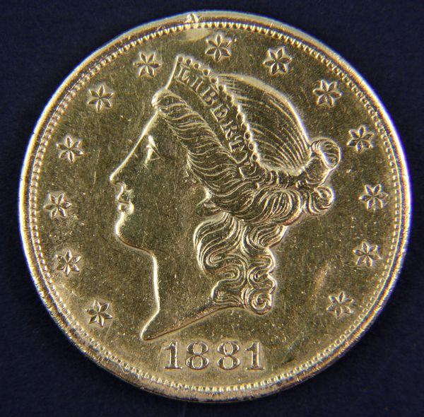 1881 Gold $20 Liberty Coin Locket : 1881 14K gold double eagle $20 liberty coin locket, tests 14k gold, 1 5/16"dia, 0.7oz/12 dwt t.w. One small crease at rim; not graded.