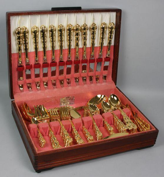 Large Gold Plated Flatware Set: Large gold plated flatware set, service for twelve (12), includes numerous serving spoons, all in case.