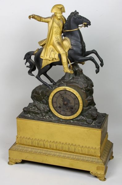 Mid 19th C. Bronze of Napoleon: Mid 19th Century dore gilt bronze clock with Napoleon on horseback, having pendulum and key, 20"h x 12"w x 6 1/2"d.